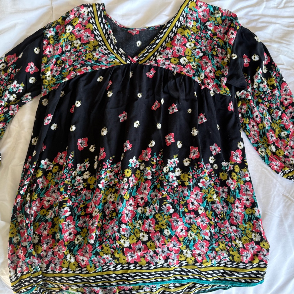 Tunic size large Free people ?